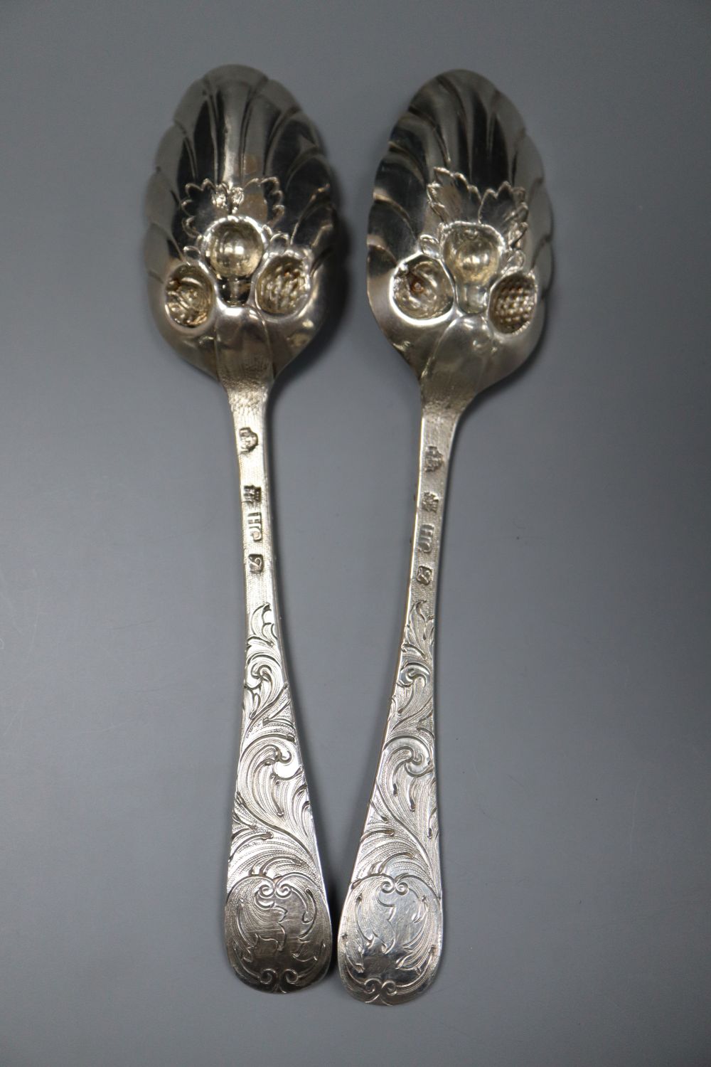 A pair of George II Scottish silver berry spoons, James Mitchell I, Edinburgh, 1754, 21.2cm, 4.5 oz.